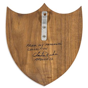 (ASTRONAUTS--APOLLO 16.) DUKE, CHARLES. Wood and acrylic plaque Signed and Inscribed, "From my personal / collection / Charlie Duke / A